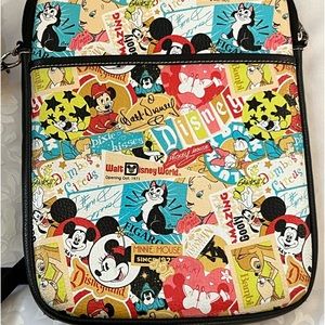 Pre-owned Disney Parks multi character cross-body Tech bag.